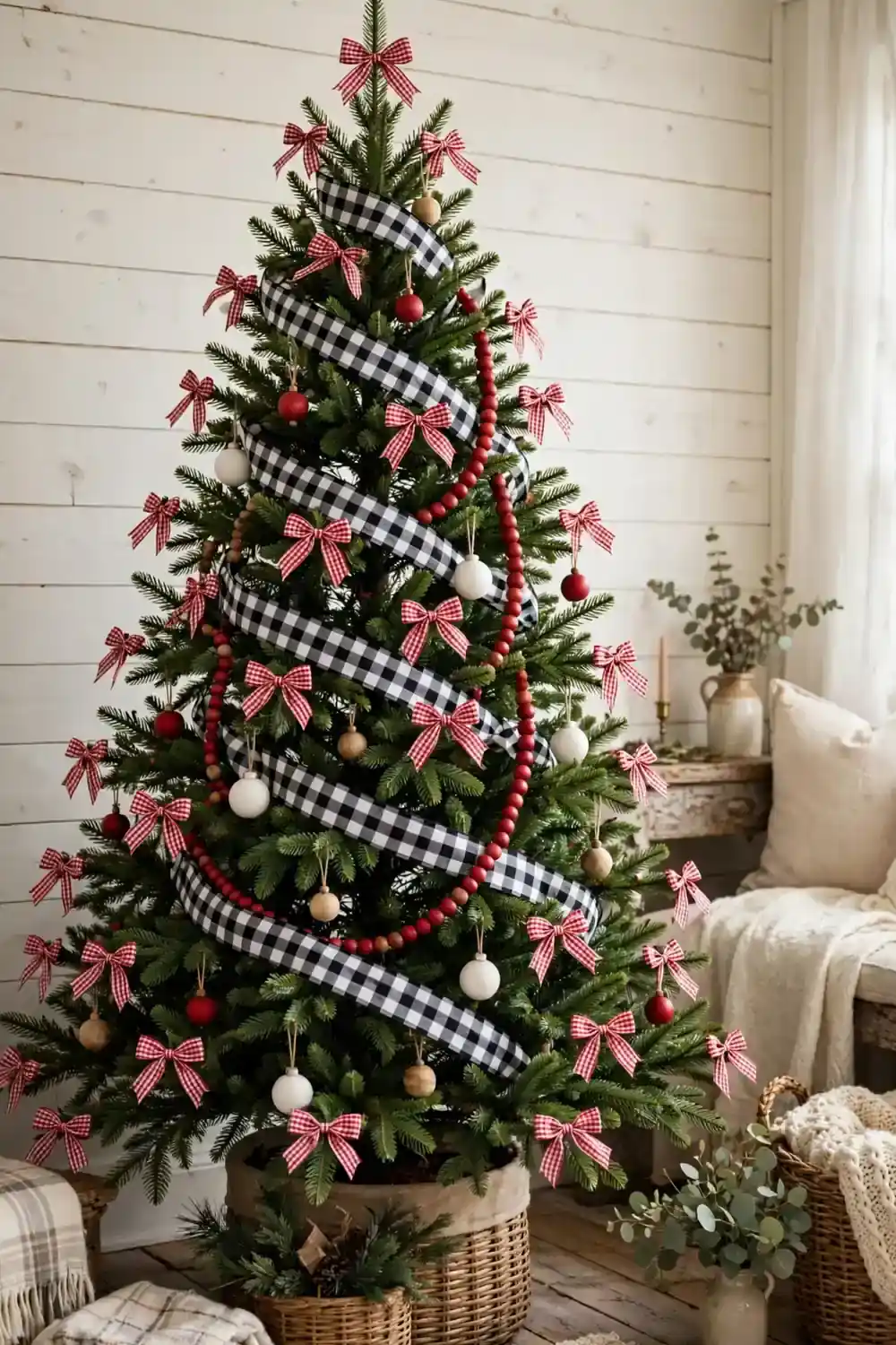 Christmas tree decorated with gingham bows and check ribbon, a charming christmas tree decor idea with pattern play