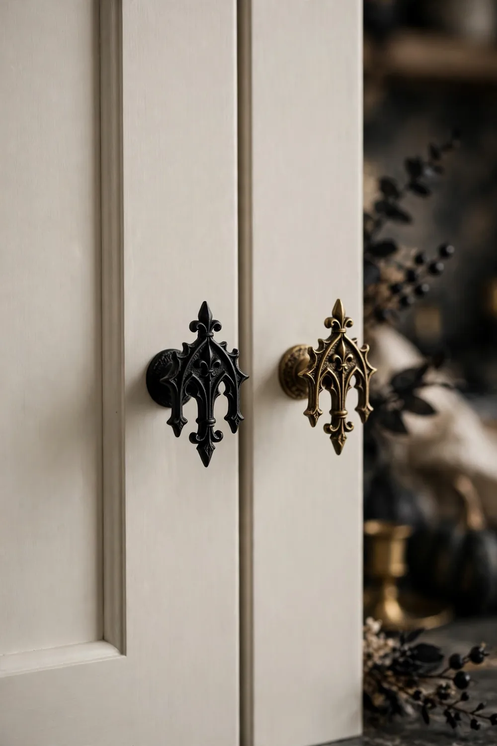 Gothic cabinet knob swap for Halloween kitchen decor Kitchen cabinets with matte black and gothic style knobs swapped in for Halloween
